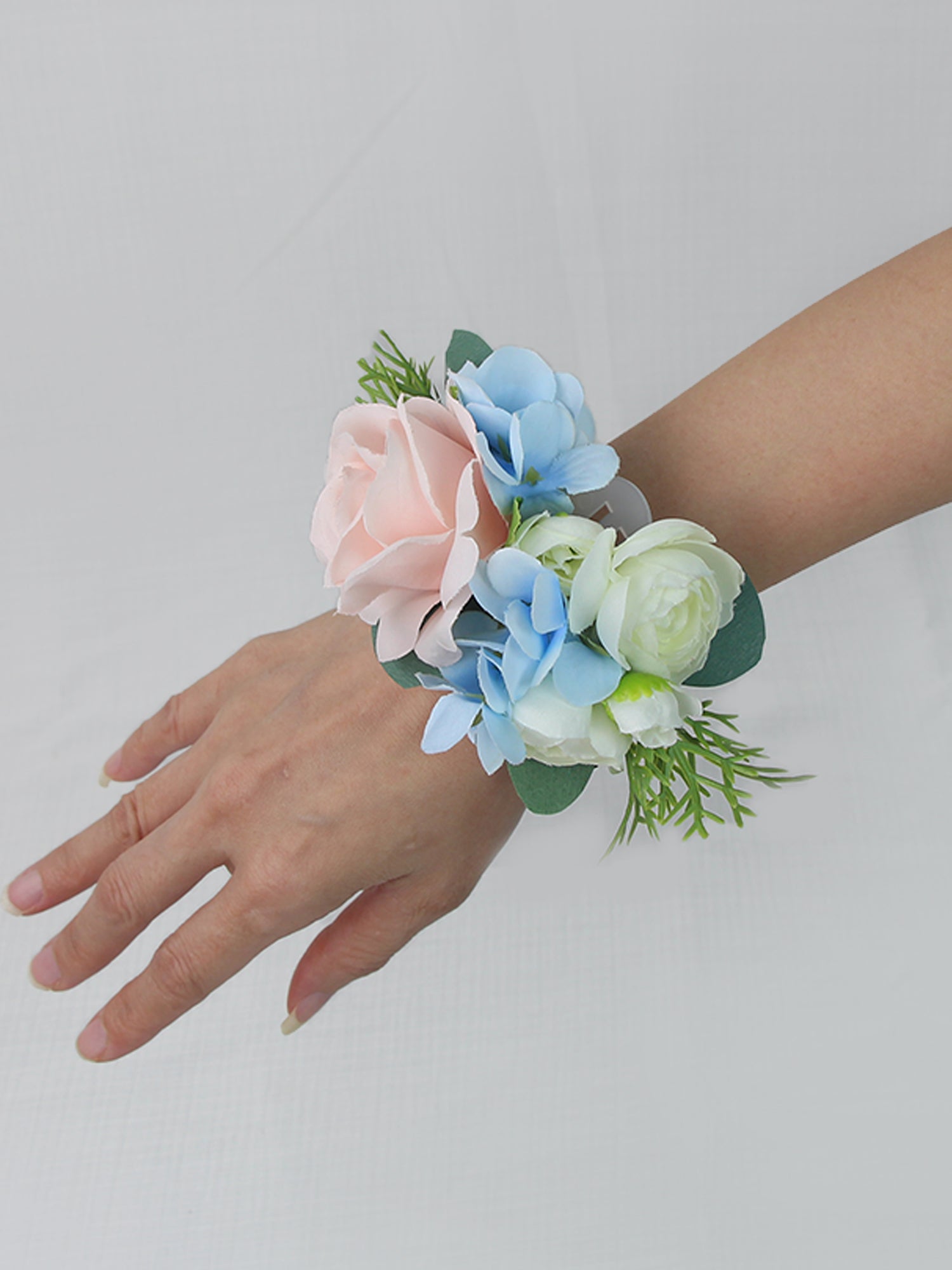 Handgelenk-Corsage in Rosa und Babyblau