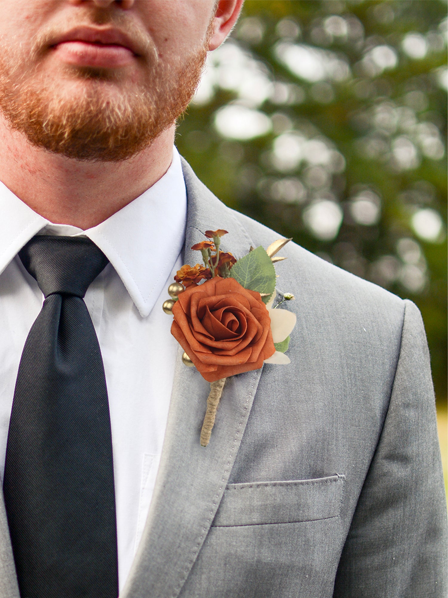 Conjunto de ramillete y boutonniere naranja quemado